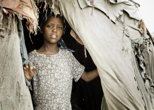 A photo of a young refugee in a nomadic hut, East Africa. Source: Getty Images